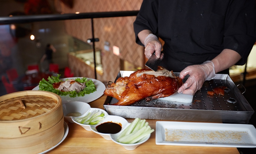 Image 1: 41% Off a Seven-Course Duck Dinner at Lao Sze Chuan